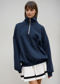 Erica – Sweter damski oversize z zamkiem pod szyją