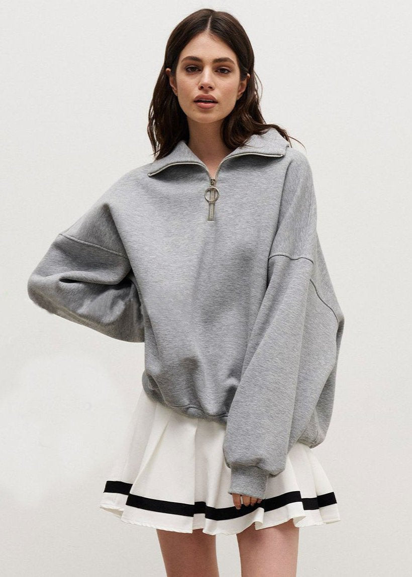 Erica – Sweter damski oversize z zamkiem pod szyją