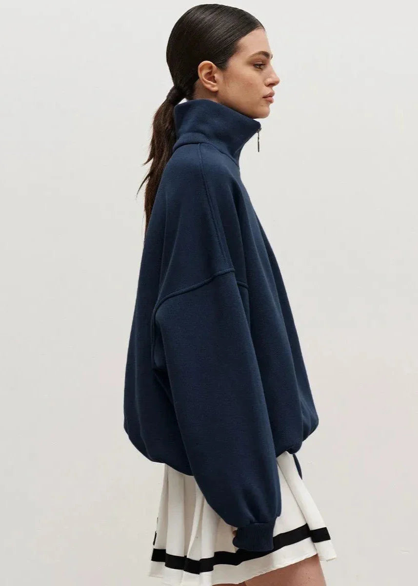 Erica – Sweter damski oversize z zamkiem pod szyją