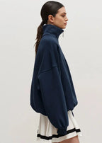 Erica – Sweter damski oversize z zamkiem pod szyją