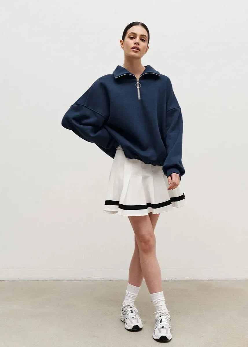 Erica – Sweter damski oversize z zamkiem pod szyją