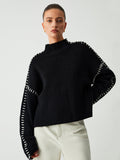 Erica – Sweter damski oversize ze stójką i kontrastowymi przeszyciami
