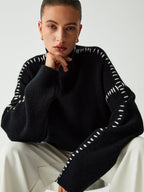 Erica – Sweter damski oversize ze stójką i kontrastowymi przeszyciami