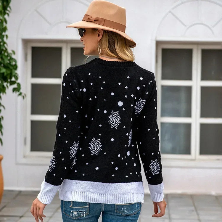 Rita – Luźny sweter damski ze świątecznym wzorem