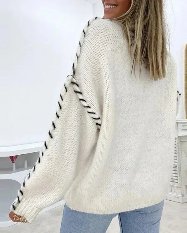 Puszysty sweter damski z okrągłym dekoltem