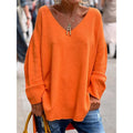 Sweter damski oversize z dekoltem w serek
