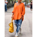 Sweter damski oversize z dekoltem w serek